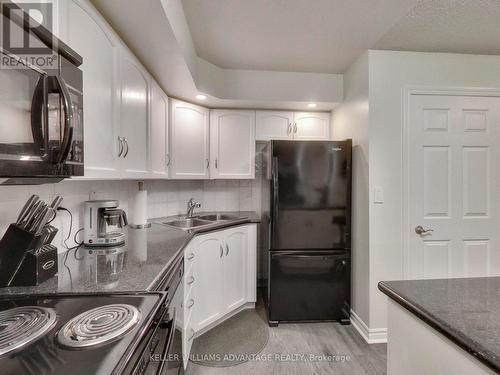 521 - 270 Wellington Street W, Toronto, ON - Indoor Photo Showing Kitchen With Double Sink