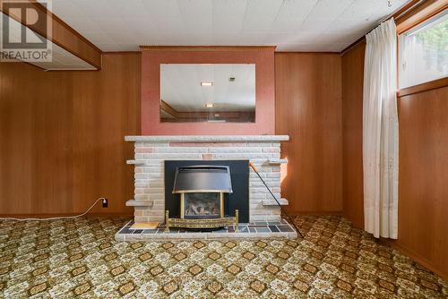 215 Sloane Avenue, Toronto, ON - Indoor Photo Showing Living Room With Fireplace