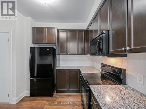 418 - 135 Village Green Square, Toronto, ON - Indoor Photo Showing Kitchen