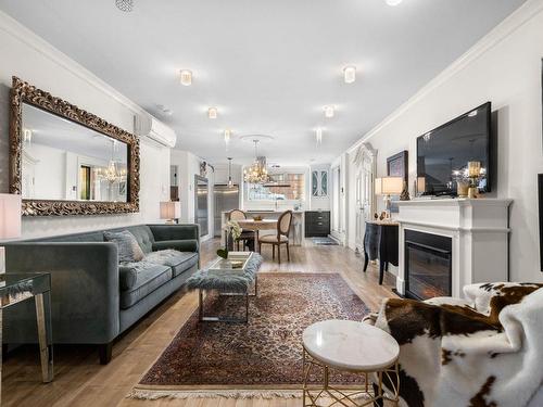 Salon - 8010 Rue De Londres, Brossard, QC - Indoor Photo Showing Living Room With Fireplace