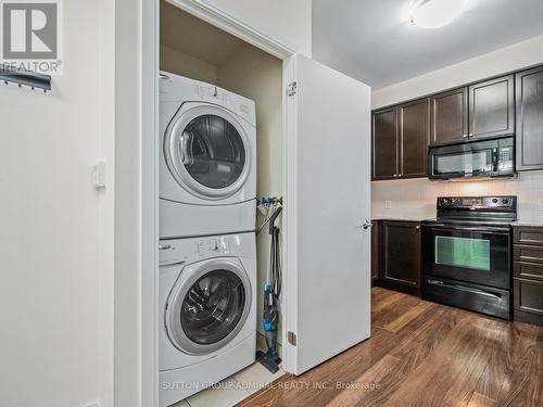 418 - 135 Village Green Square, Toronto, ON - Indoor Photo Showing Laundry Room