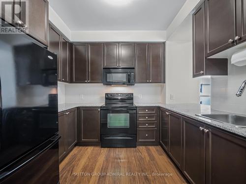 418 - 135 Village Green Square, Toronto, ON - Indoor Photo Showing Kitchen