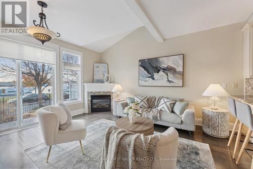 53 - 1295 Wharf Street, Pickering, ON - Indoor Photo Showing Living Room With Fireplace