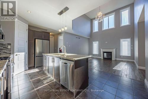 753 Kleinburg Drive, London, ON - Indoor Photo Showing Kitchen With Fireplace With Stainless Steel Kitchen