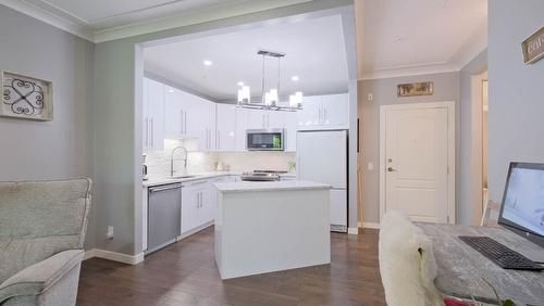 104-1966 Enterprise Way, Kelowna, BC - Indoor Photo Showing Kitchen