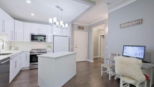 104-1966 Enterprise Way, Kelowna, BC - Indoor Photo Showing Kitchen With Upgraded Kitchen