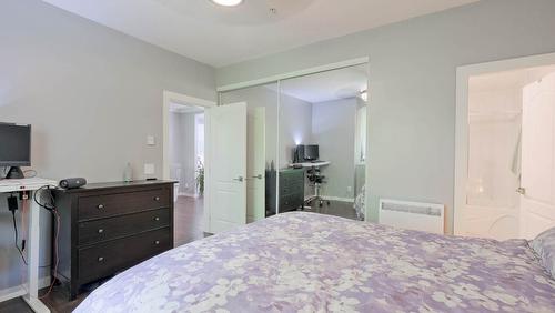 104-1966 Enterprise Way, Kelowna, BC - Indoor Photo Showing Bedroom