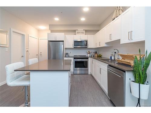 407-2843 Jacklin Rd, Langford, BC - Indoor Photo Showing Kitchen With Stainless Steel Kitchen With Double Sink