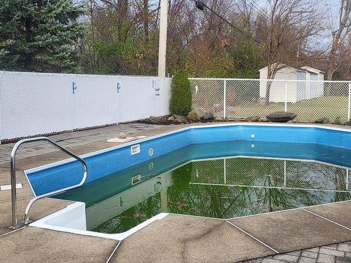 Piscine - 4-665 Rue De Chevillon, Laval (Chomedey), QC - Outdoor With In Ground Pool