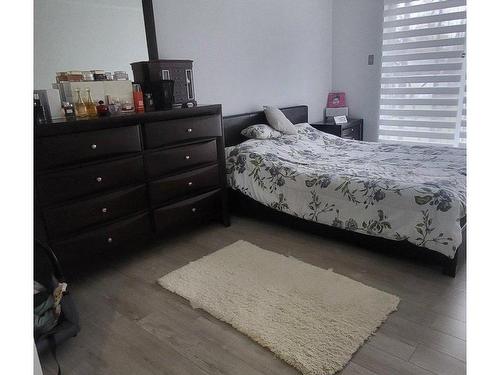 Chambre Ã Â coucher - 4-665 Rue De Chevillon, Laval (Chomedey), QC - Indoor Photo Showing Bedroom