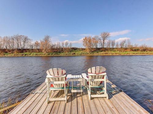 Waterfront - 1081 Tsse Bellevue, Saint-Valérien-De-Milton, QC - Outdoor With Body Of Water With Deck Patio Veranda With View