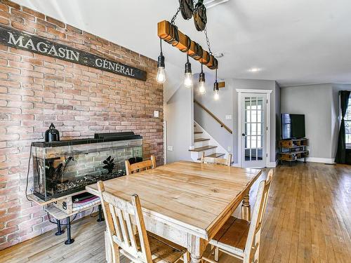 Dining room - 17750 Rue Notre-Dame, Mirabel, QC - Indoor With Fireplace