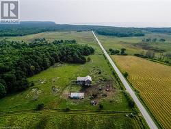 Barn with well for cattle and storage shed. - 