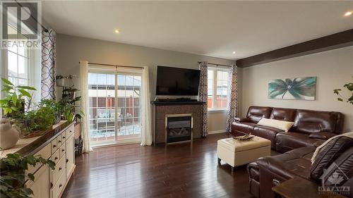 755 Oakglade Avenue, Kanata, ON - Indoor Photo Showing Living Room With Fireplace