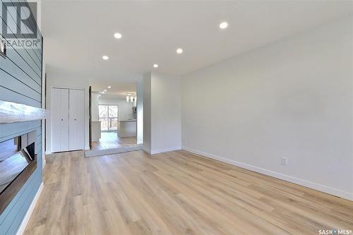 78 Deergrove Crescent, Regina, SK - Indoor Photo Showing Other Room With Fireplace