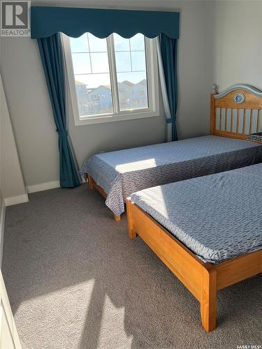 16 525 Mahabir Lane, Saskatoon, SK - Indoor Photo Showing Bedroom