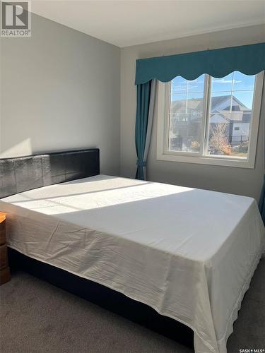 16 525 Mahabir Lane, Saskatoon, SK - Indoor Photo Showing Bedroom