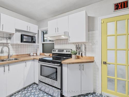 391 Kingston Rd, Toronto, ON - Indoor Photo Showing Kitchen With Double Sink