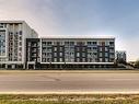 612-95 Dundas St W, Oakville, ON  - Outdoor With Balcony With Facade 