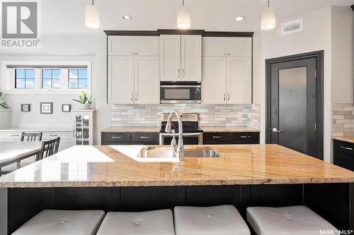 1022 Pohorecky Bay, Saskatoon, SK - Indoor Photo Showing Kitchen With Stainless Steel Kitchen With Double Sink With Upgraded Kitchen