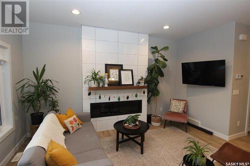 671 Fast Crescent, Saskatoon, SK - Indoor Photo Showing Living Room With Fireplace