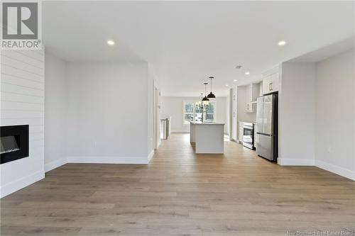 130 Elsliger Street, Dieppe, NB - Indoor Photo Showing Living Room With Fireplace