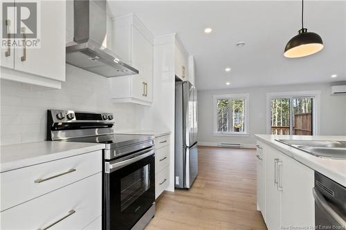 130 Elsliger Street, Dieppe, NB - Indoor Photo Showing Kitchen With Double Sink With Upgraded Kitchen