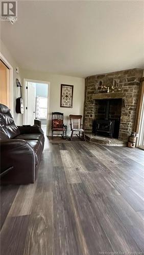 39 Ch Bloc 14, Acadieville, NB - Indoor Photo Showing Living Room With Fireplace