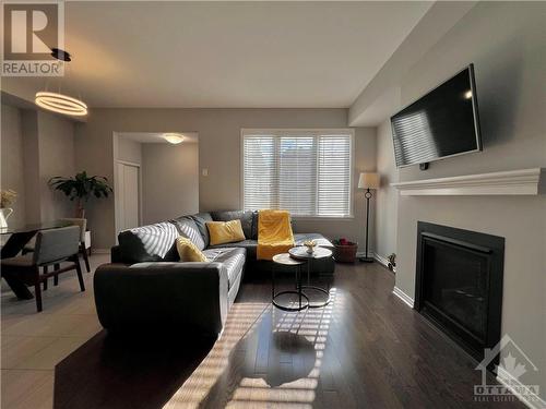 342 Sweetflag Street, Ottawa, ON - Indoor Photo Showing Living Room With Fireplace