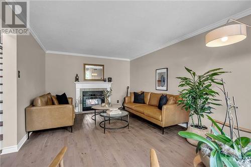 1441 Talcy Crescent, Ottawa, ON - Indoor Photo Showing Living Room With Fireplace