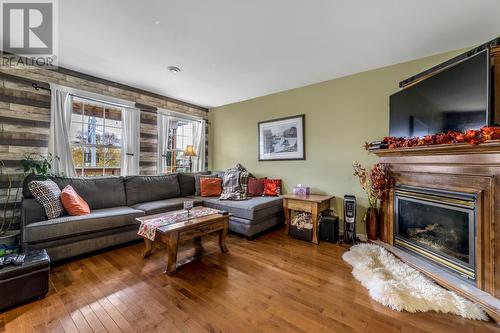 8 Hennesseys Place, Conception Bay South, NL - Indoor Photo Showing Living Room With Fireplace