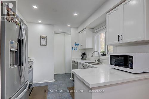 65 Trevino Circle, Barrie, ON - Indoor Photo Showing Kitchen With Double Sink