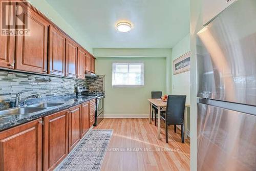 108 - 400 Mississauga Valley Boulevard, Mississauga, ON - Indoor Photo Showing Kitchen With Double Sink