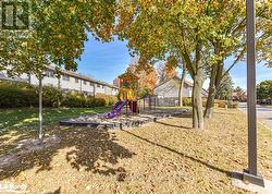 View of yard featuring a playground - 