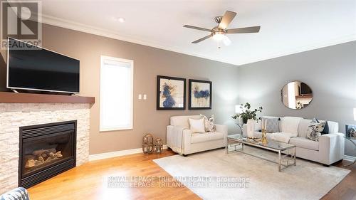 1174 Aintree Road, London, ON - Indoor Photo Showing Living Room With Fireplace