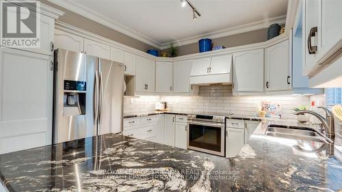 1174 Aintree Road, London, ON - Indoor Photo Showing Kitchen With Double Sink With Upgraded Kitchen