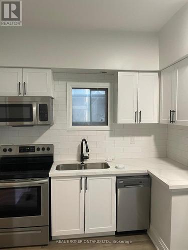 Lower - 202 Victoria Avenue N, Hamilton, ON - Indoor Photo Showing Kitchen With Double Sink