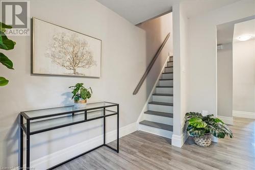 Stairs with wood-type flooring - 130 Livingston Avenue Unit# 21, Grimsby, ON - Indoor Photo Showing Other Room