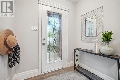 Entrance foyer featuring light hardwood / wood-style floors and plenty of natural light - 130 Livingston Avenue Unit# 21, Grimsby, ON - Indoor Photo Showing Other Room