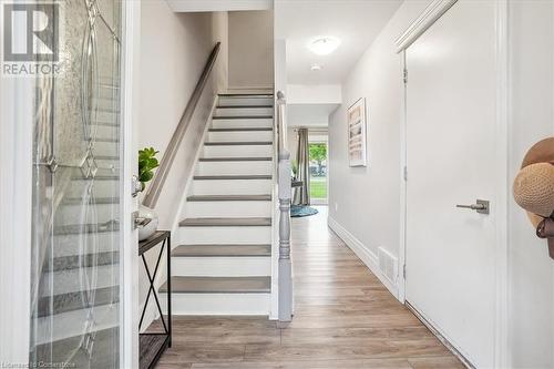 Stairway with wood-type flooring - 130 Livingston Avenue Unit# 21, Grimsby, ON - Indoor Photo Showing Other Room