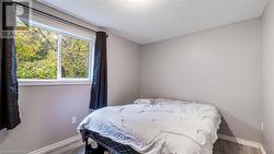 Experience the easy of a main floor primary bedroom. - 