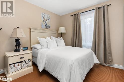 1235 Deerhurst Drive Unit# 52-107, Huntsville, ON - Indoor Photo Showing Bedroom