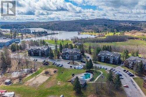 1235 Deerhurst Drive Unit# 52-107, Huntsville, ON - Outdoor With Body Of Water With View