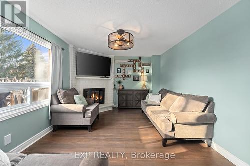 140 Natanya Boulevard, Georgina, ON - Indoor Photo Showing Living Room With Fireplace