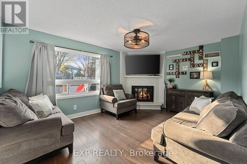 140 Natanya Boulevard, Georgina, ON - Indoor Photo Showing Living Room With Fireplace