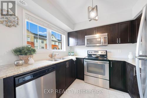 14 - 2480 Post Road, Oakville, ON - Indoor Photo Showing Kitchen With Stainless Steel Kitchen With Double Sink