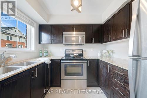 14 - 2480 Post Road, Oakville, ON - Indoor Photo Showing Kitchen With Stainless Steel Kitchen With Double Sink