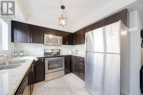 14 - 2480 Post Road, Oakville, ON - Indoor Photo Showing Kitchen With Stainless Steel Kitchen With Double Sink