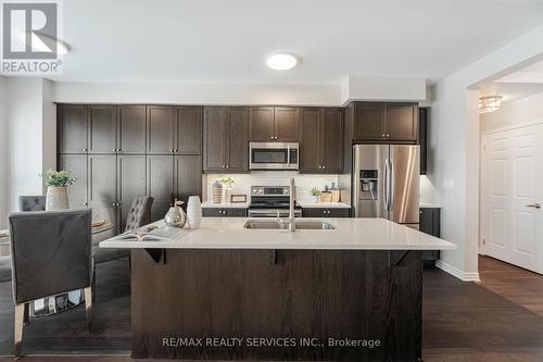 91 Maple Cider Street, Caledon, ON - Indoor Photo Showing Kitchen With Double Sink With Upgraded Kitchen