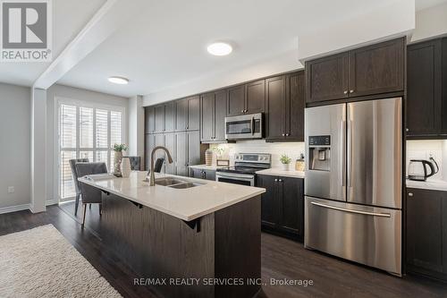 91 Maple Cider Street, Caledon, ON - Indoor Photo Showing Kitchen With Double Sink With Upgraded Kitchen